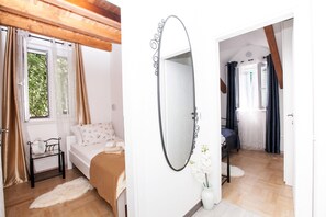 Penthouse, 2 Bedrooms | Premium bedding, desk, iron/ironing board, free cribs/infant beds