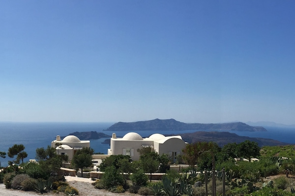 The Dome House in its garden setting