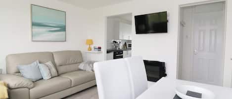 Smart TV, DVD player, table football, books