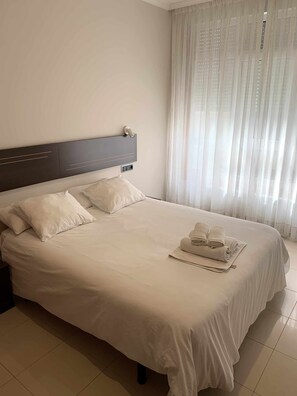 2 dormitoris, planxa i posts de planxar, wifi gratuïta i roba de llit 