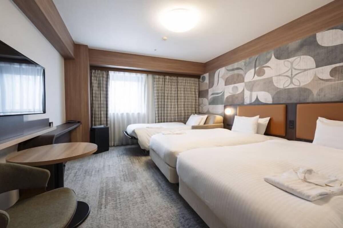 Desk, blackout curtains, free WiFi, bed sheets