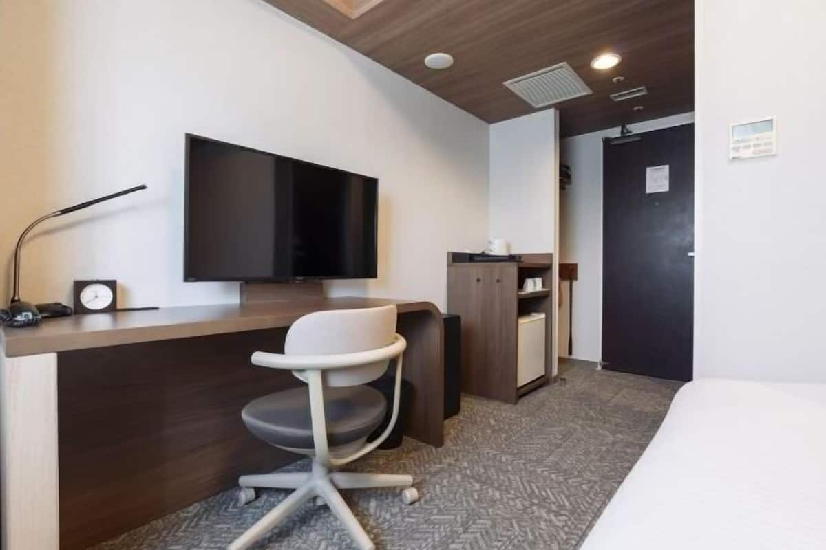 Desk, blackout curtains, free WiFi, bed sheets