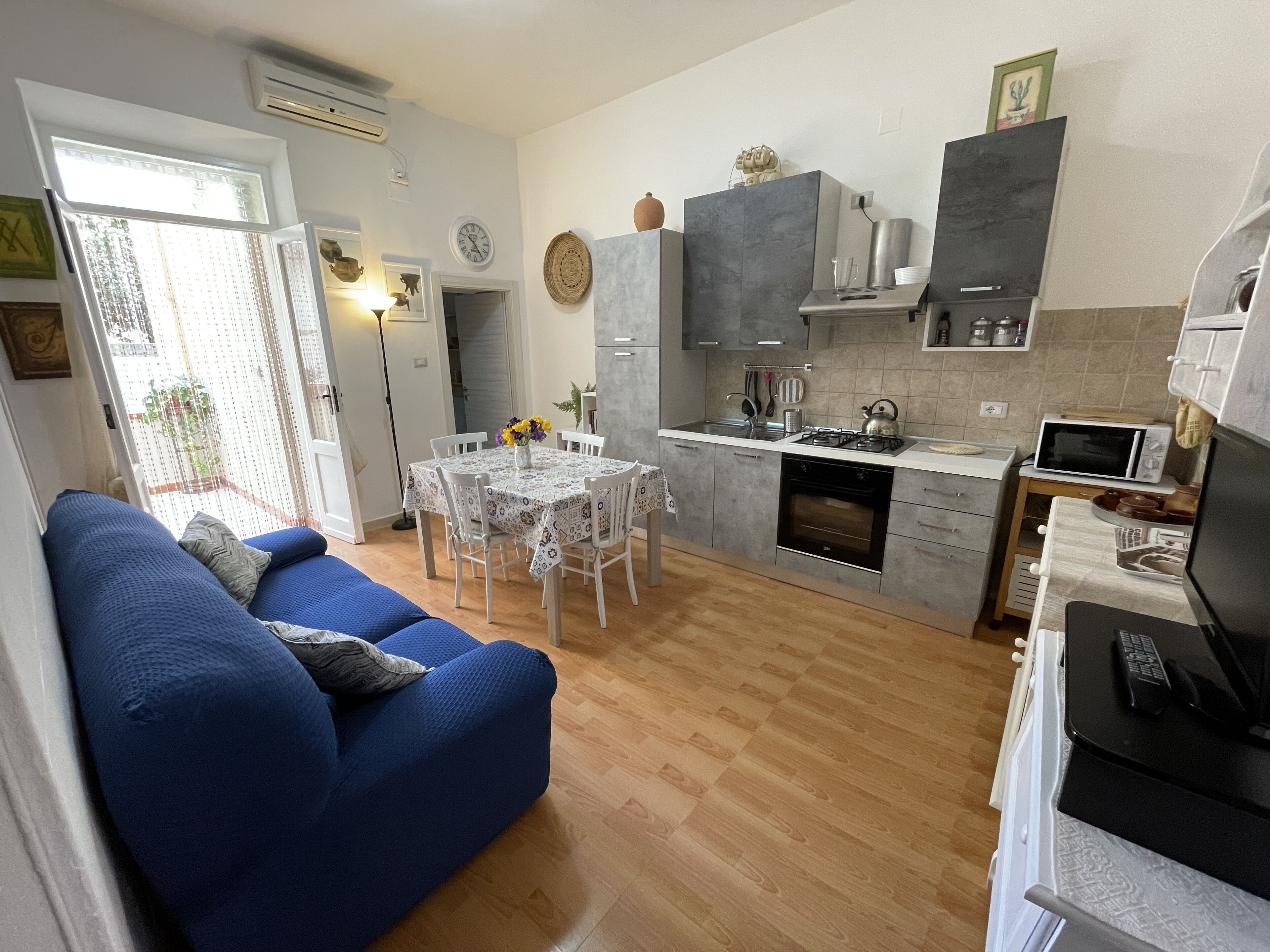 Flowered Domus with balcony.