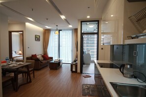Apartment, 1 Bedroom | Living area | LCD TV