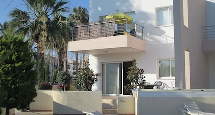 Ground Floor Apartment with Pool, A/C, TV, DVD, WIFI, Patio & Private Parking