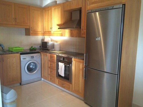 Ground Floor Apartment with Pool, A/C, TV, DVD, WIFI, Patio & Private Parking