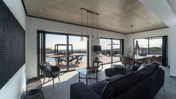 Deluxe Villa, Ocean View | Living area