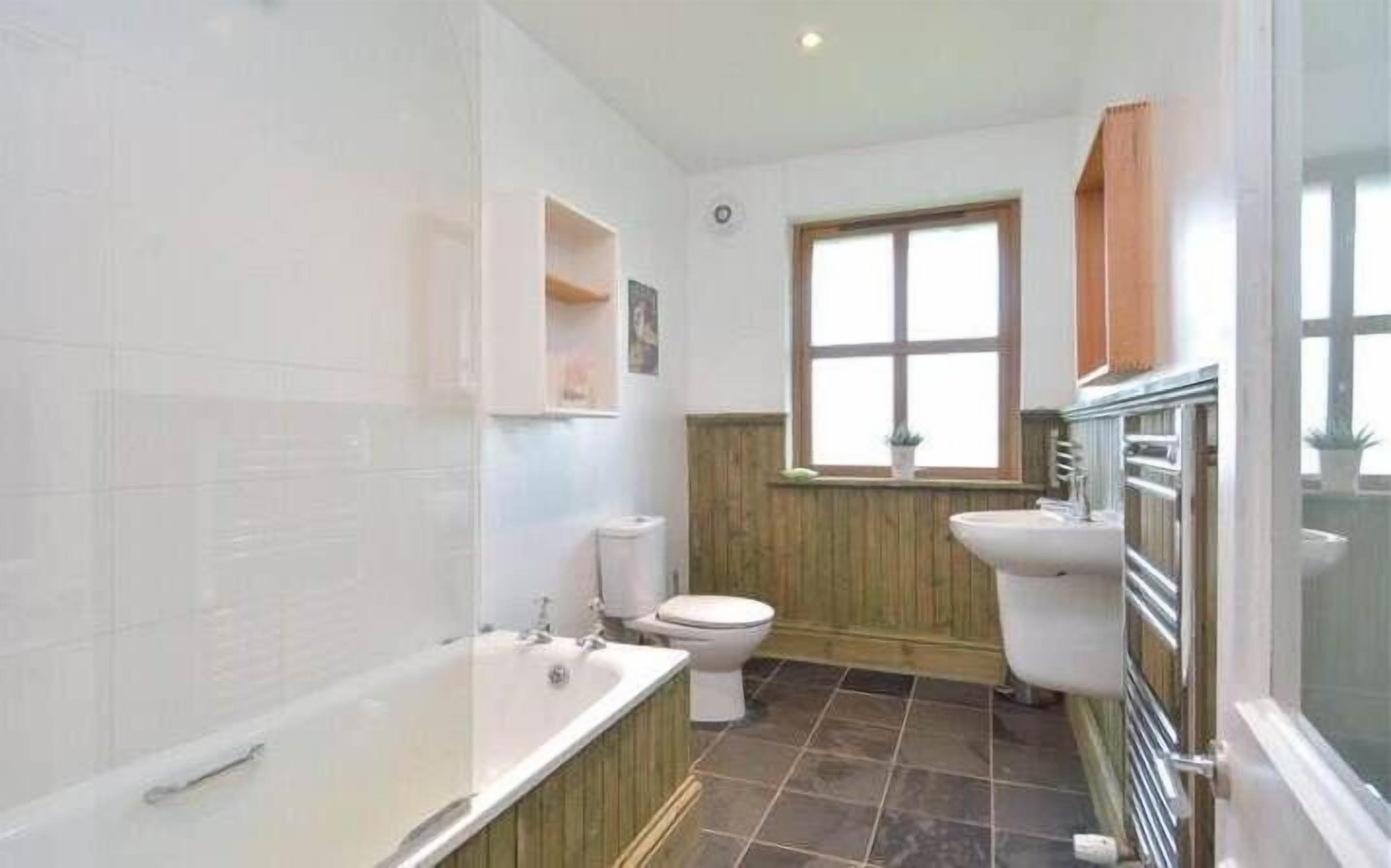 Combined shower/tub, hair dryer, towels, toilet paper