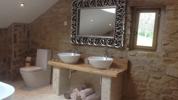 Combined shower/tub, hair dryer, towels, soap