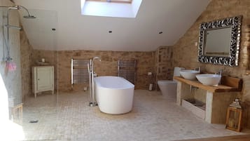 Combined shower/tub, hair dryer, towels, soap