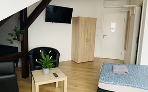 Deluxe-Vierbettzimmer | Schallisolierte Zimmer, kostenloses WLAN, Bettwäsche