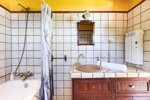 Combined shower/tub, jetted tub, hair dryer, bidet