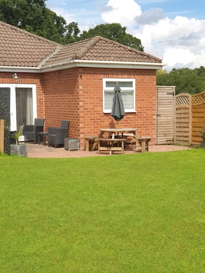 rear patio area  also use of large shared garden/lawn 