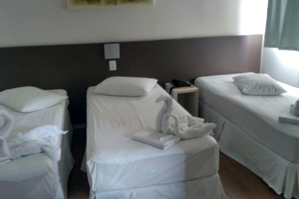 deluxe triple room, 3 single beds | 1 bedroom, minibar, desk, blackout curtains