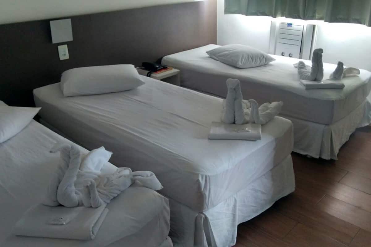 deluxe triple room, 3 single beds | 1 bedroom, minibar, desk, blackout curtains