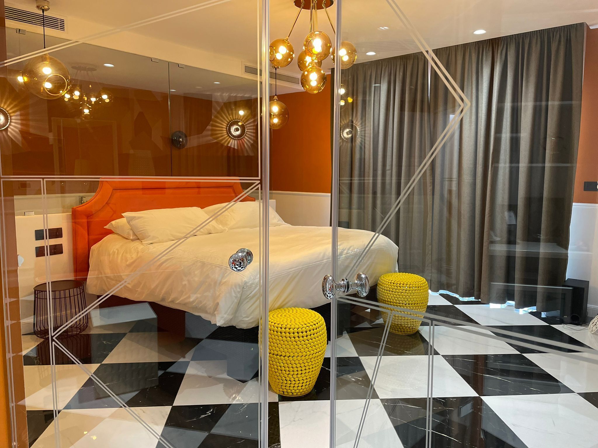 deluxe suite, 1 king bed with sofa bed | in-room safe, blackout curtains, soundproofing, iron/ironing board