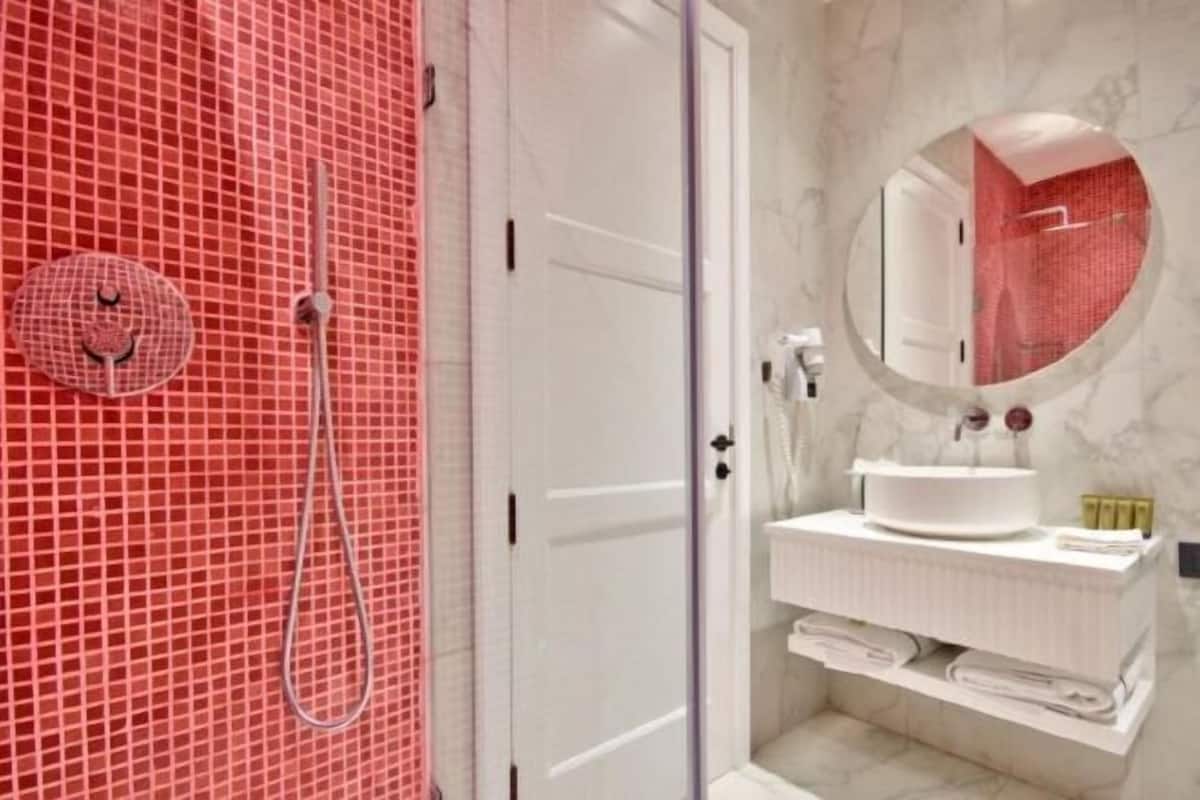 Bathroom | Shower, rainfall showerhead, slippers, towels