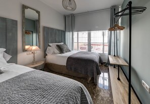 4 habitaciones, tabla de planchar con plancha, wifi y ropa de cama 