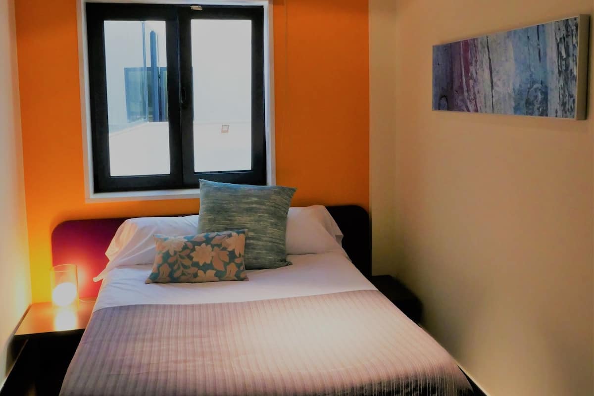 Economy Double Room | In-room safe, desk, blackout drapes, iron/ironing board