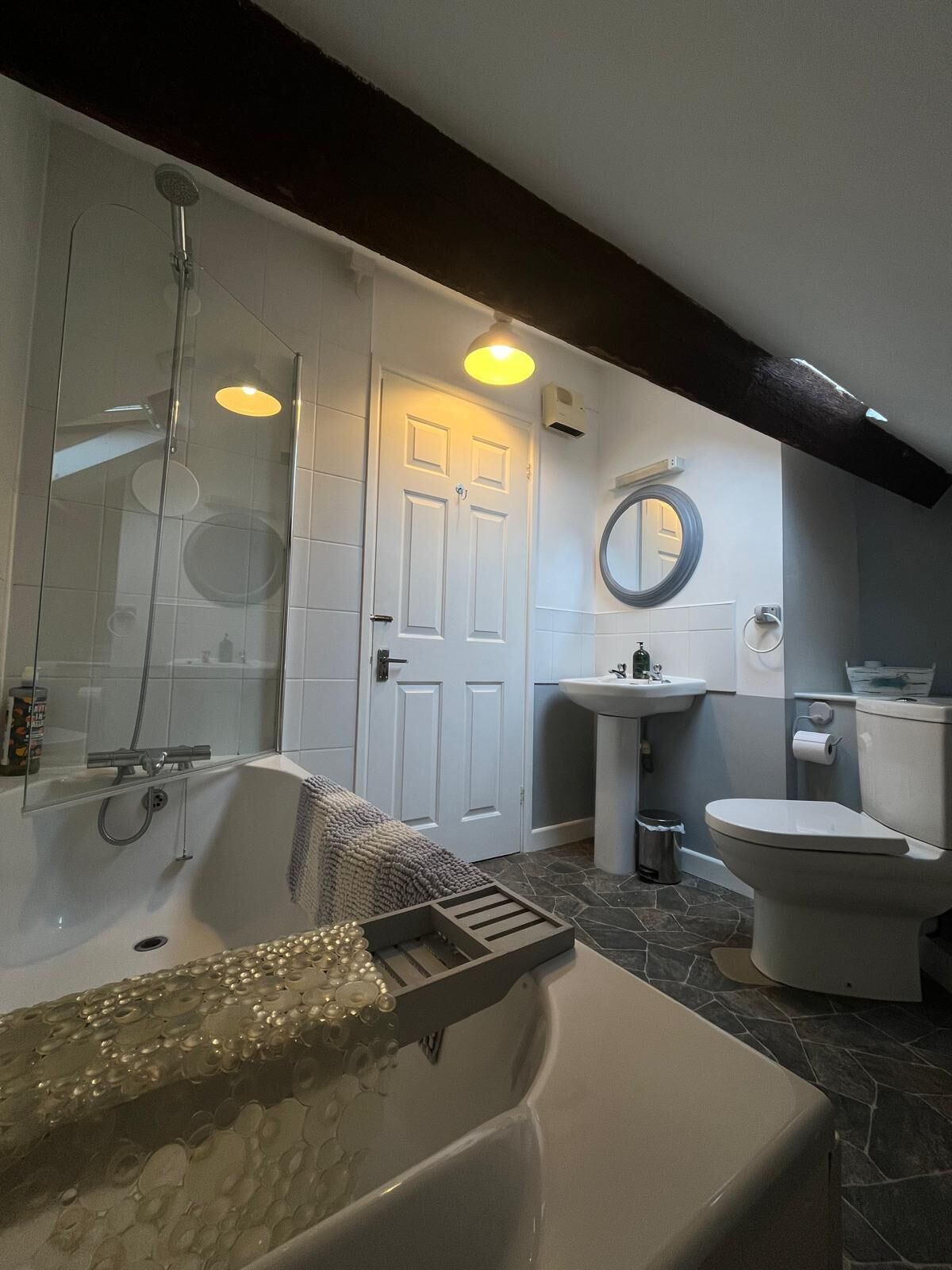 Combined shower/tub, hair dryer, towels, soap