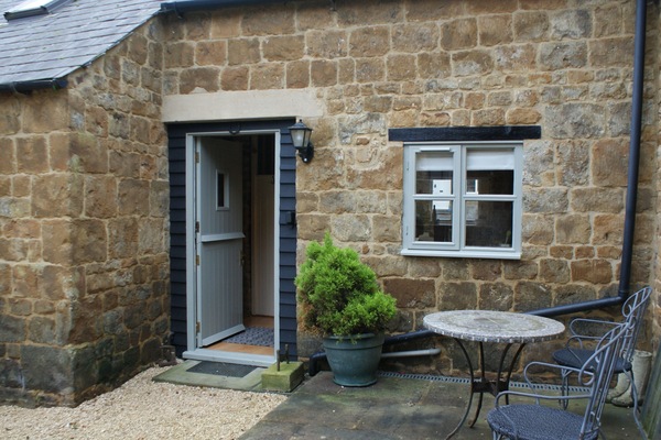 Entrance to cottage and patio area