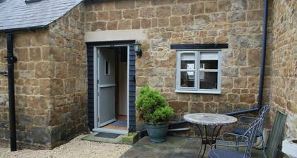 Accogliente cottage d'epoca nel villaggio incontaminato sul bordo del Cotswolds