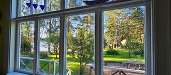 A cozy traditional seaside cottage for 2+child. Sauna, use of hot tub & row boat