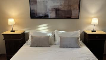 2 habitaciones, tabla de planchar con plancha y cuna de viaje