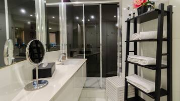 Shower, hair dryer, towels, soap
