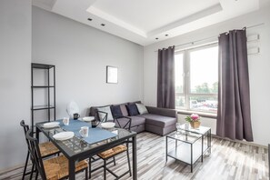 Classic Apartment, 1 Queen Bed with Sofa bed, Non Smoking, City View | Living area | Flat-screen TV - Prudentia Apartments Kłobucka (Warsaw)