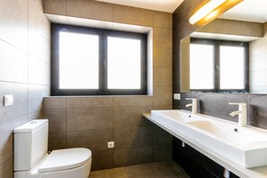 Bathtub, hair dryer, towels, soap