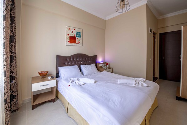 Habitación doble urbana | Sábanas de algodón egipcio y ropa de cama de alta calidad 