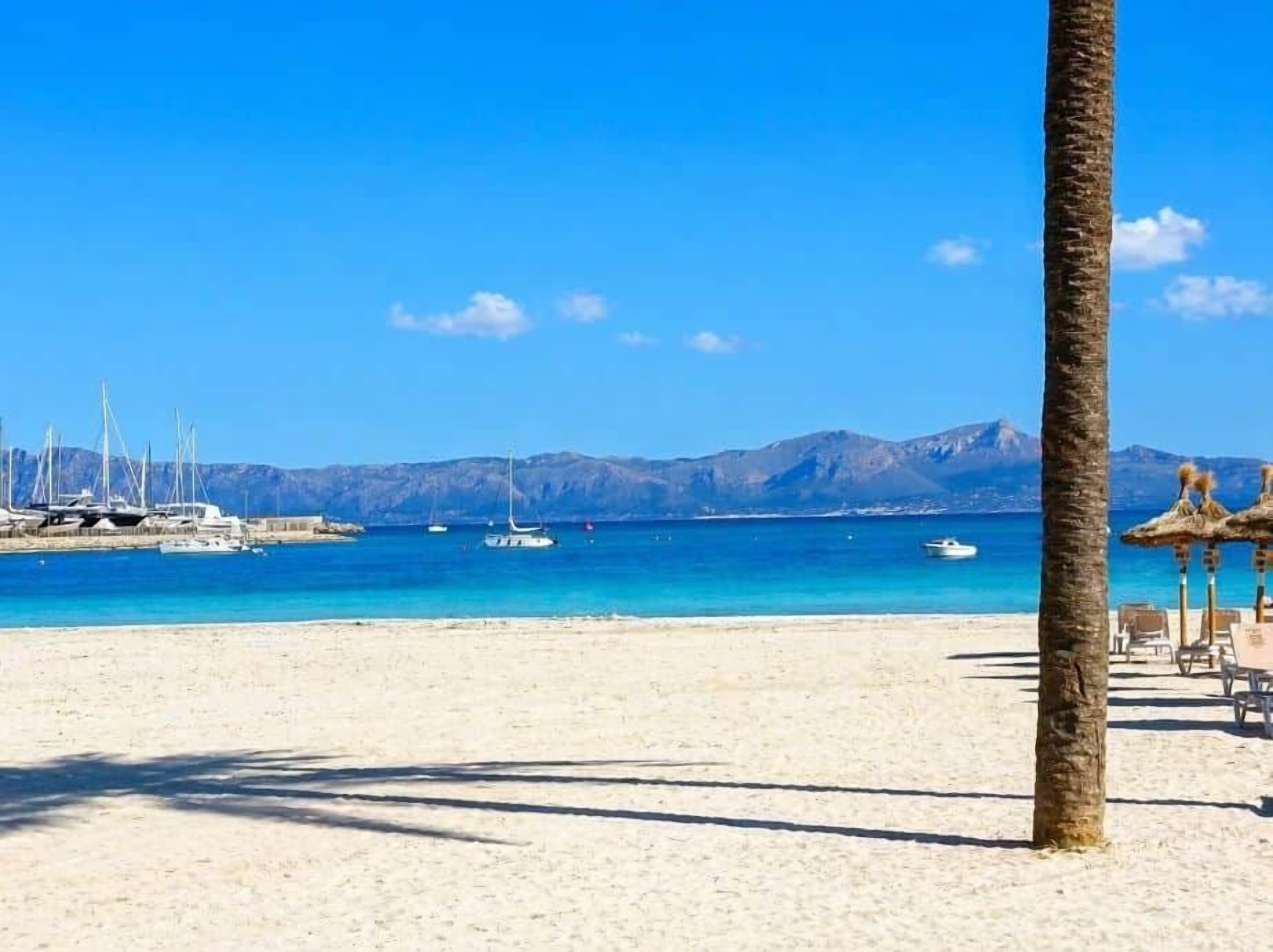 On the beach, sun-loungers, beach towels