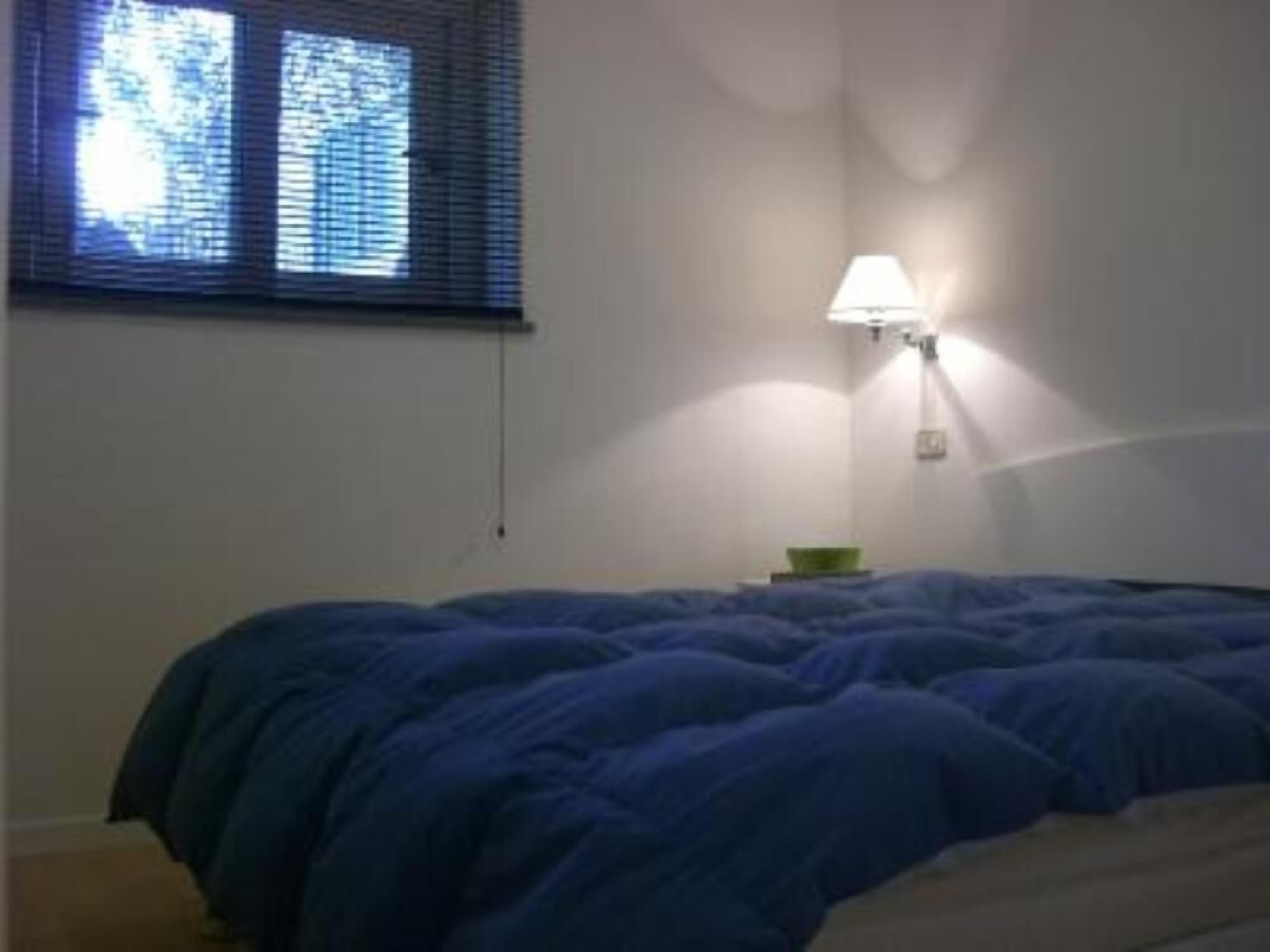 1 quarto, ferros/tábuas de passar roupa