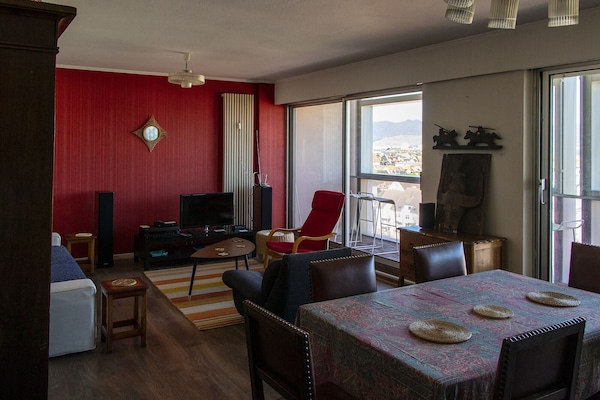Salon-salle à manger avec grand balcon-terrasse