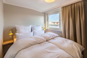 Departamento, 2 habitaciones | Ropa de cama hipoalergénica y insonorización 