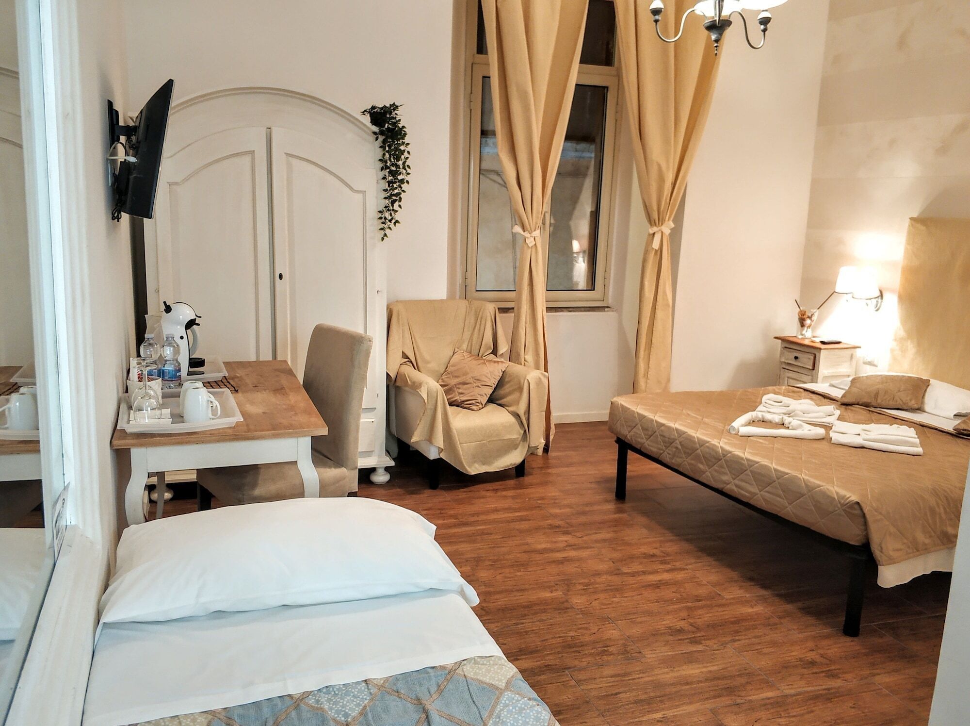 Desk, blackout drapes, iron/ironing board, cribs/infant beds