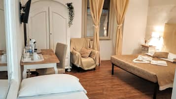 Desk, blackout drapes, iron/ironing board, cribs/infant beds