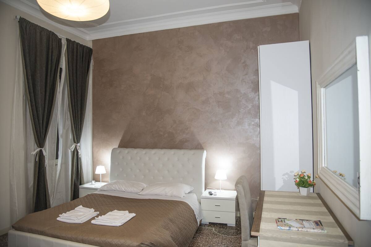 Desk, blackout curtains, iron/ironing board (on request), free WiFi