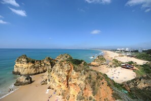 Na praia, toalhas de praia 