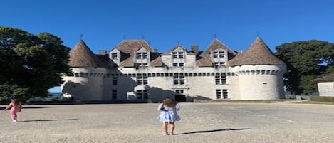 A castle with multiple towers and a large courtyard.