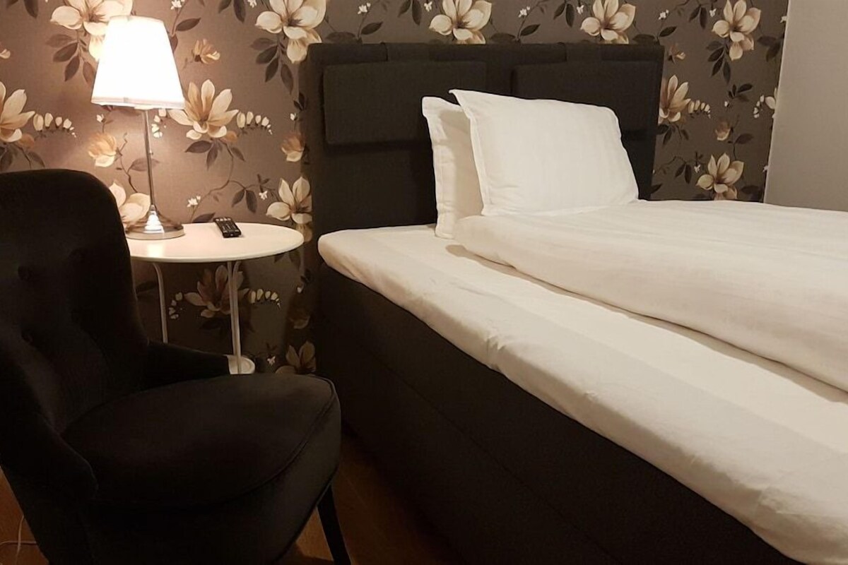 Blackout drapes, iron/ironing board (on request), WiFi (free)