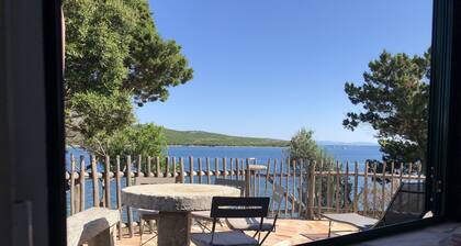 In Pianottoli-Caldarello, bonifacio stone villa, feet in the water