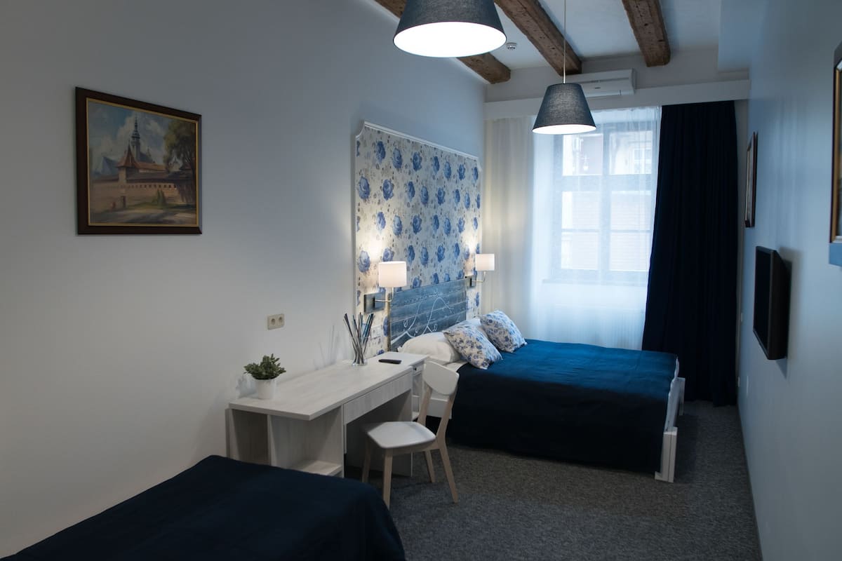 Junior suite (Suite) | Een minibar, een kluis op de kamer, een bureau, verduisterende gordijnen