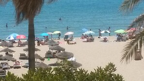 A la platja i tovalloles de platja