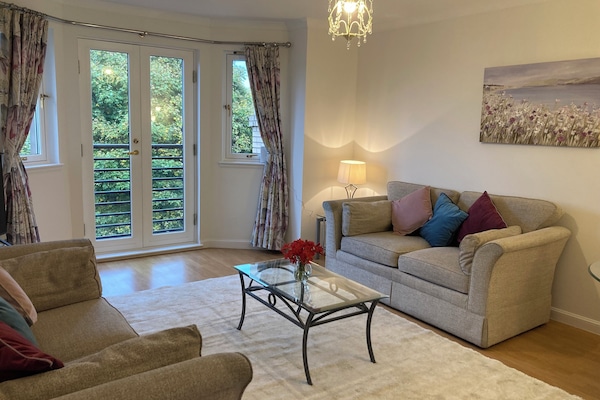Spacious dining lounge with views over Edinburgh Skyline during Winter months.