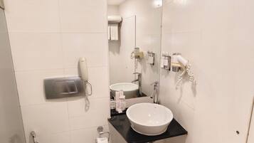 Shower, free toiletries, slippers, towels