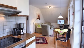 Basic Condo (Wohnung 1) | Living area | Flat-screen TV