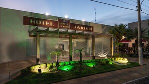 A hotel named "Hotel Jardim" with a glass facade and illuminated signage. - Hotel Jardim (Jardim)