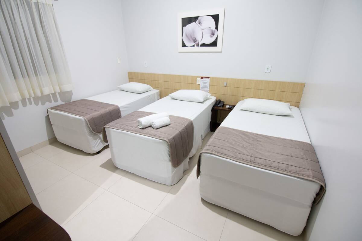 Apartment (Triplo) | Minibar, WiFi (free), bed sheets